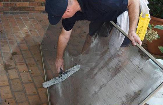 Hand-washing a window screen