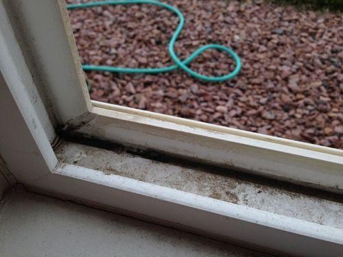 Window sill and frame before cleaning