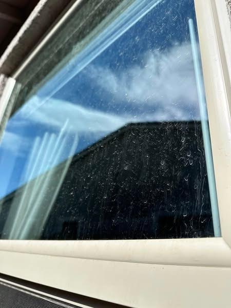 Glass before window cleaning